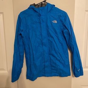 The North Face boys size XL electric blue rain coat with pockets.